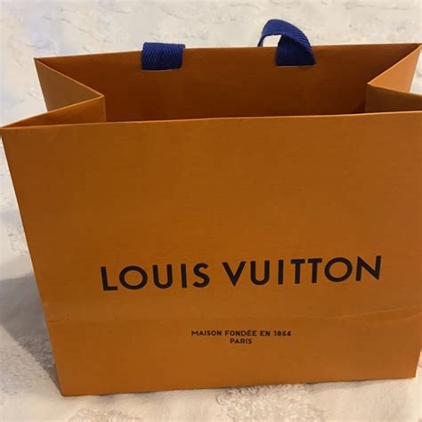 louis vuitton orange handbag 5 years old